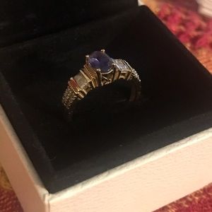 14kt gold Tanzanite and Diamond ring size 8. Tanzanite is 1.02 oval 16 diamonds